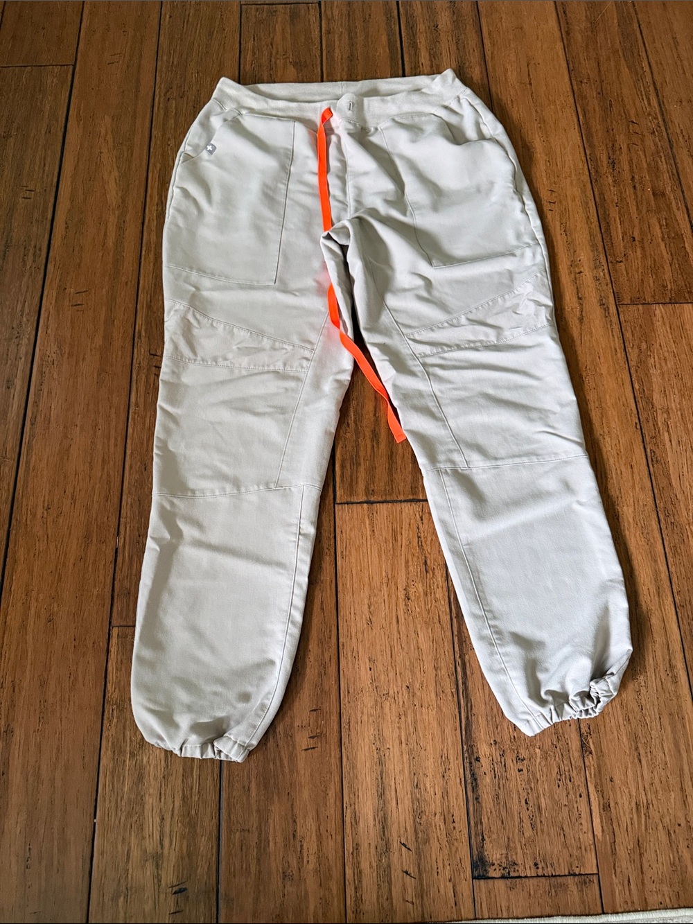 Figs Women's Jogger Scrub Pants in khaki with Orange Drawstring